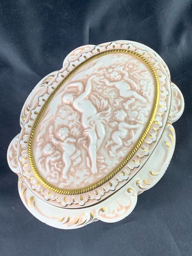 Vintage porcelain bowl with Cherubs