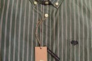 Paul Costelloe green shirt