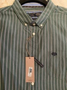 Paul Costelloe green shirt