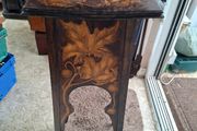 Antique Art Nouveau Table features intricate Pyrogravure Poker Work design around 1900 and arched supports