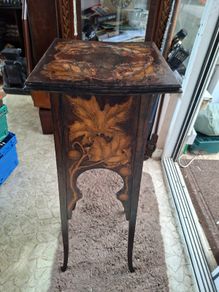 Antique Art Nouveau Table features intricate Pyrogravure Poker Work design around 1900 and arched supports
