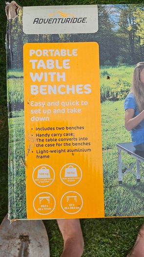Portable table with benches