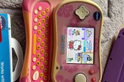 Vtech branded Mobigo 2 handheld game console WITH games