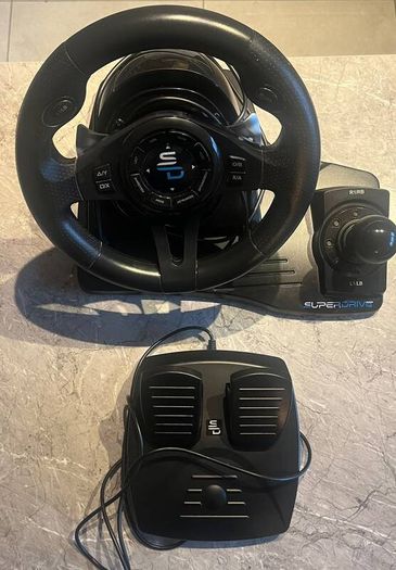 X-Box 1s with steering wheel and peddles