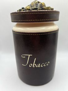 Antique tobacco jar with brass lion head