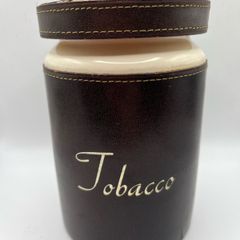 Antique tobacco jar with brass lion head