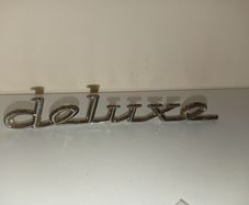 Classic Car " DELUXE " CAR BADGE, Good condition with 2 mounting pins vintagewned
