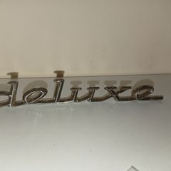 Classic Car " DELUXE " CAR BADGE, Good condition with 2 mounting pins vintagewned