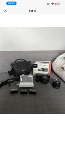 Sony a6000 + 16-50 kit lens + Neewer 1.7/35 lens + Accessories