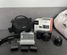 Sony a6000 + 16-50 kit lens + Neewer 1.7/35 lens + Accessories
