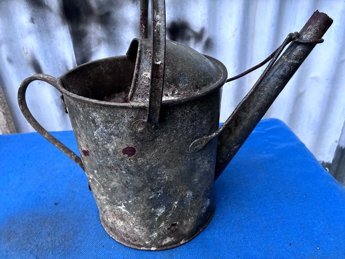 Vintage galvanised watering can