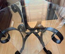 glass table with iron legs