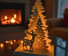 Light-up wooden Christmas tree and reindeer ornament