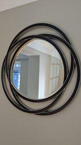 Contemporary circular wall mirror - black and silver finish
