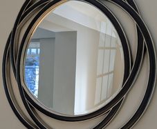 Contemporary circular wall mirror - black and silver finish