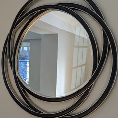 Contemporary circular wall mirror - black and silver finish