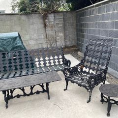 6 seater wrought iron set with a table and 2x side tables