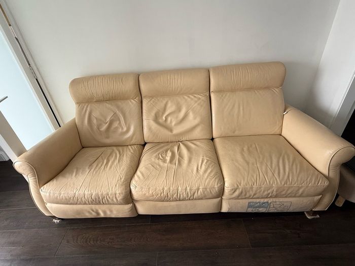 Free - Leather recliner sofa in cream-available end April