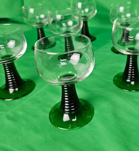 Set of eight antique Luminarc France glasses with green, ribbed stems