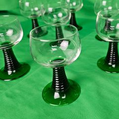 Set of eight antique Luminarc France glasses with green, ribbed stems
