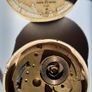 Lot of Antique Watch Parts in Containers Image 3