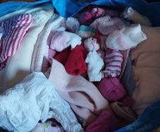 Bag of baby girl clothes