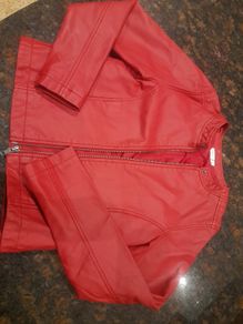 Girl's red leather jjacket.