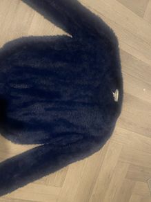 2 fluffy jumpers