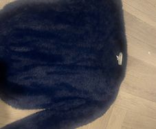 2 fluffy jumpers