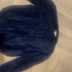 2 fluffy jumpers