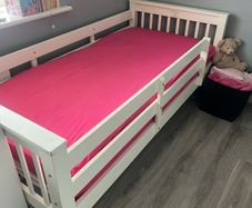 white wooden single bed