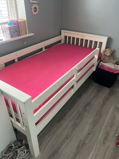 white wooden single bed