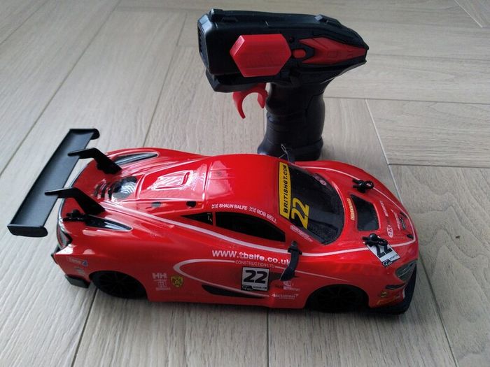 3 remote control vehicles & 1 blue racecar with lights & sounds