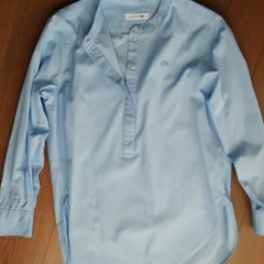 Lacoste blouse fits size 36