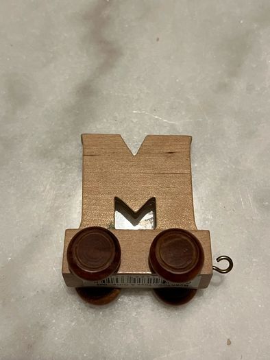 Letters, toys. Name Mia