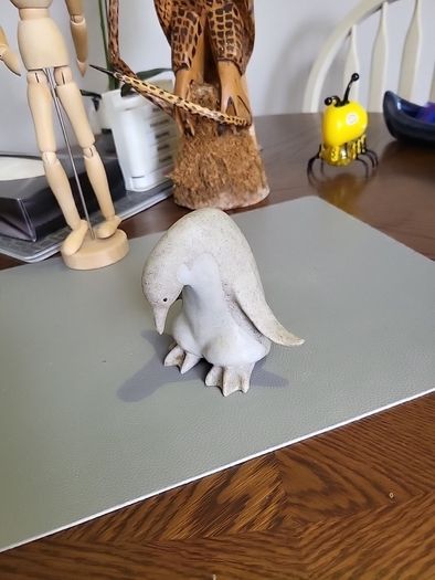 Penguin carved stone