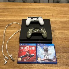 playstation 4, 2 controllers, 2 games and cable for charging controllers