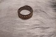 Clear stones and metal wrap bracelet