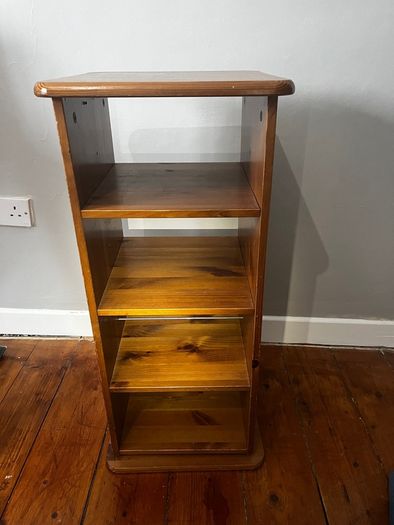 Rotating book CD shelf