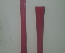 Tall red glass vase.