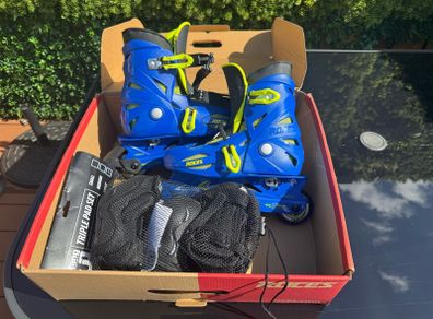 Roces Orlando Adjustable Inline Skates with Protective Pads Like New
