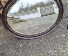 Antique oval bevelled mirror