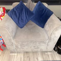 grey 3 & 1 seater couch & footstool