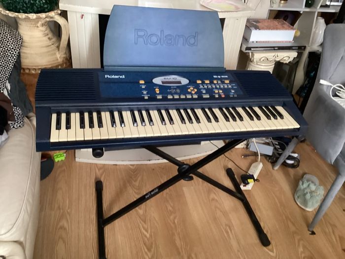 EM-10 Creative Keyboard with music stand and keyboard stand in excellent working condition for quick sale