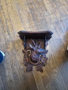 antique carved stag shelf