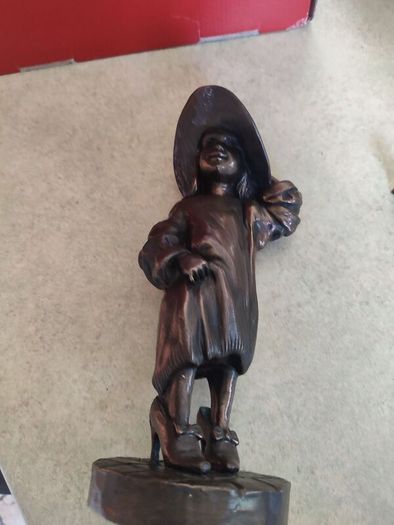 Genesis Sculpture Of A Small Girl Dressing Up With Her Moms Clothes