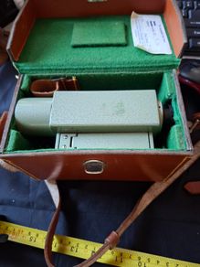 Vickers S24 Surveying Level in Original Leather Case, The instrument features a distinctive green metal body. It is designed for high-precision leveling in construction and engineering application