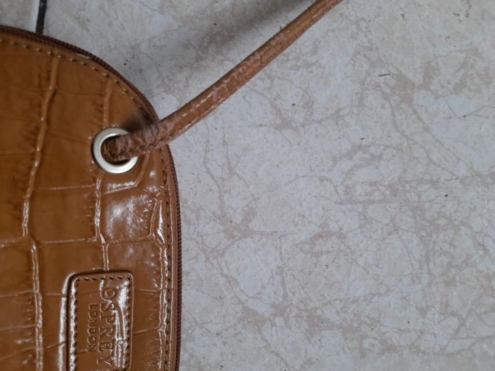 Osprey bag. Small tan leather bag with long shoulder strap