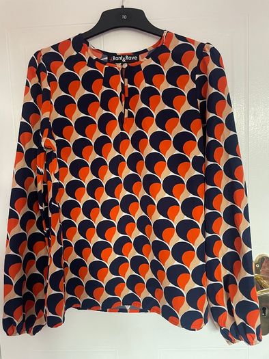 Orange and navy top