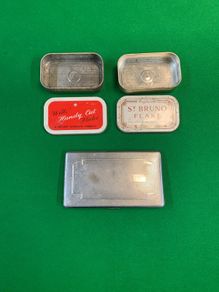 Vintage cigarette case and two vintage tobacco tins